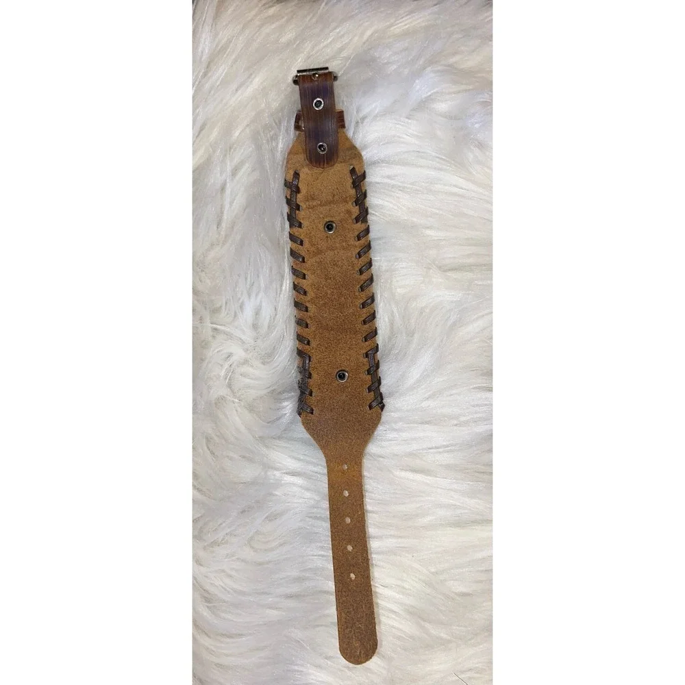 Leather wrist band Engraved verse. ‘God is with her she will not fall.’Psalm46:5